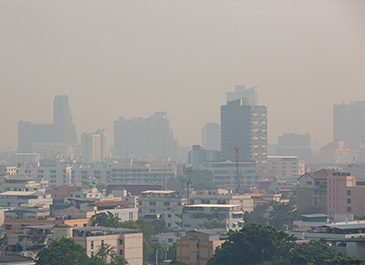 air pollution settling over a metropolitan environment